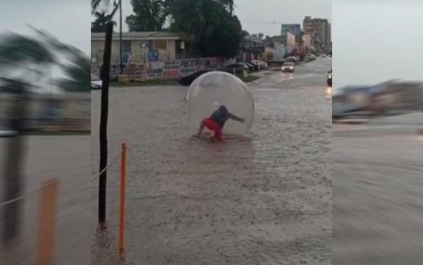  Homem sai na chuva em uma bolha aquática e vídeo viraliza